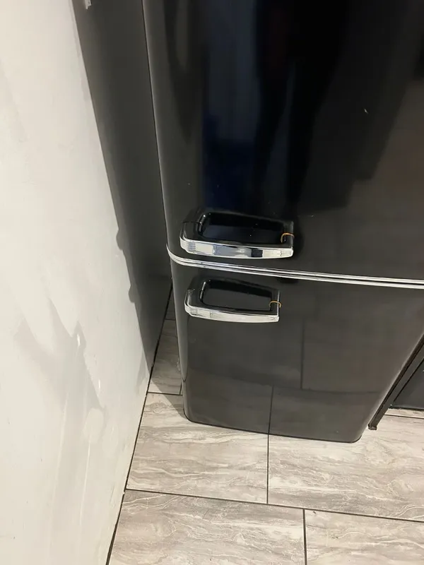 Polished stainless steel fridge door